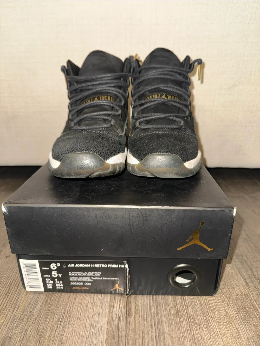 Jordan Black with Gold Accent High-Top Sneakers